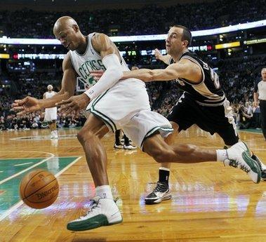 Boston Celtics' Ray Allen, left, drives past San Antonio Spurs' Manu Ginobili, of Argentina, in the first quarter of an NBA basketball game, Sunday, March 28, 2010, in Boston.(AP Photo/Michael Dwyer)