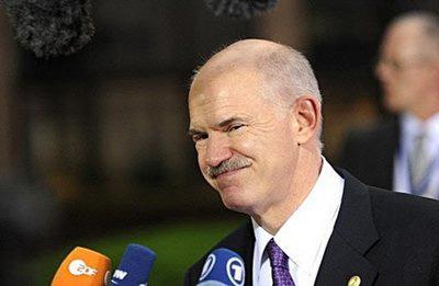 Greek Prime Minister George Papandreou speaks to media at an European Union summit at the European Council headquarters in Brussels. (AFP/John Thys)