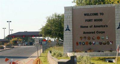 An entrance to Fort Hood Army Base in Fort Hood, Texas, near Killeen remains in lock-down following a mass shooting on Thursday, Nov. 5, 2009.(AP Photo/Jack Plunkett)