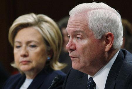 U.S. Secretary of Defense Robert Gates, (R), and U.S. Secretary of State Hillary Clinton (L) testify at a Senate Foreign Relations Committee Capitol Hill in Washington, December 3, 2009.(Xinhua/Reuters Photo)