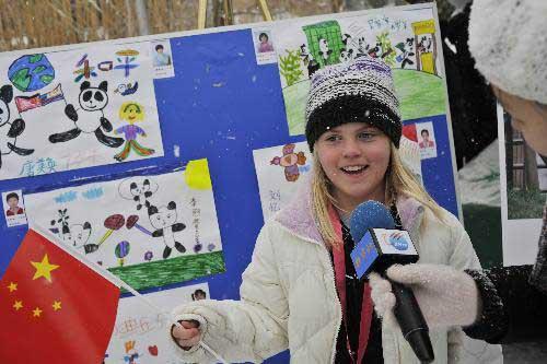 Five-year-old Haley from New York speaks to reporters during a farewell party for giant panda Tai Shan at the National Zoo in Washington D.C., the United States, Jan. 30, 2010. (Xinhua/Zhang Jun)