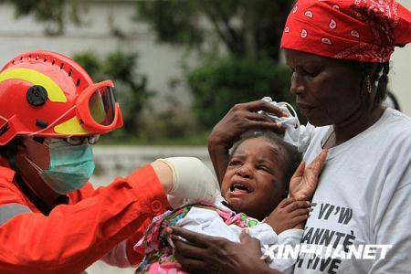 A Chinese rescue team arrived in Haiti's capital Port-au-Prince early Thursday morning. The 68-strong team brought 10 tons of food, equipment and medicine. They were among the first group of international rescuers to arrive at the quake-zone.