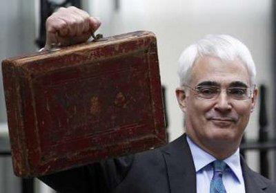 Britain's Chancellor of the Exchequer Alistair Darling holds Gladstone's old Budget box for the cameras outside 11 Downing Street, before delivering the annual Budget to the House of Commons in central London March 24, 2010. REUTERS/Kevin Coombs