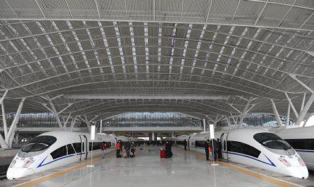 The test-running trains prepares for their first journey at the station in Guangzhou, capital of south China's Guangdong Province, Dec. 9, 2009. (Xinhua/Lu Hanxin) 