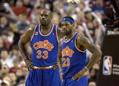 FILE - In this Jan. 10, 2010 photo, Cleveland Cavaliers forward James LeBron, right, and center Shaquille O'Neal are shown during the first half of an NBA basketball game against the Portland Trail Blazers in Portland, Ore. Pried away in a trade with Phoenix last June to aid LeBron James' drive for a first championship, O'Neal has helped the Cavs move atop the league's standings and positioned them to end the city's 46-year drought without a major sports title.(AP Photo/Don Ryan)