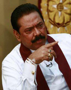 Sri Lanka's President Mahinda Rajapaksa points during a meeting with the international media in Colombo January 27, 2010.REUTERS/Andrew Caballero-Reynolds