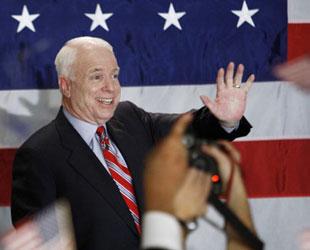 Republican presidential candidate U.S. Senator John McCain (R-AZ) greets supporters at his New Hampshire primary night rally in Nashua Jan. 8, 2008. McCain capped a stunning comeback from the political scrap heap on Tuesday, beating Mitt Romney in New Hampshire to give new life to his once struggling U.S. Republican presidential campaign. (Xinhua/Reuters Photo)