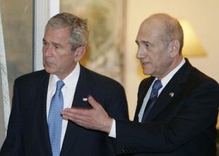 United States President George W. Bush, and Israeli Prime Minister Ehud Olmert, right, arrive for a joint press conference  in Jerusalem, Wednesday Jan. 9, 2008. (AP Photo/Lefteris Pitarakis, pool) 