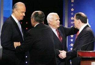 U.S. Republican presidential candidates, former U.S. Senator Fred Thompson (R-TN), former New York City mayor Rudy Giuliani, Senator John McCain (R-AZ) and former Arkansas Gov. Mike Huckabee (L-R), talk onstage at the Republican Party presidential debate, South Carolina January 10, 2008. REUTERS/Jim Young