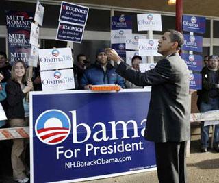 Democratic presidential candidate Senator Barack Obama (D-IL) thanks supporters of his campaign after delivering coffee and doughnuts to them at the Jewett Street School polling place in Manchester, New Hampshire, Jan. 8, 2008, on the day of the New Hampshire Primary. (Xinhua/Reuters Photo)