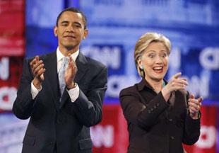 U.S. Democratic presidential candidates Senator Barack Obama (D-IL), and Senator Hillary Clinton (D-NY) gesture prior to the CNN/Los Angeles Times Democratic presidential debate in Hollywood, California Jan. 31, 2008. (Xinhua/Reuters Photo)