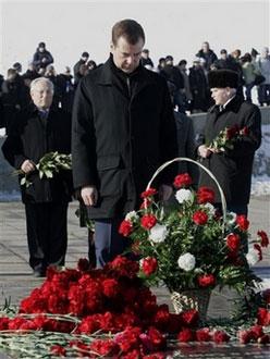 First Deputy Prime Minister and presidential front-runner Dmitry Medvedev lays flowers at the memorial built to honor those who died in the Battle of Stalingrad during World War II, in Volgograd, Russia, Saturday, Feb. 2, 2008. (AP Photo/Sergei Karpukhin, Pool)