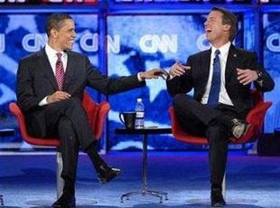 File photo shows Democratic presidential candidate Senator Barack Obama (D-IL) (L) and former Senator John Edwards (D-NC) laughing at the CNN/Congressional Black Caucus Institute Democratic Party presidential debate at the Palace Theatre in Myrtle Beach, South Carolina January 21, 2008. [Agencies]