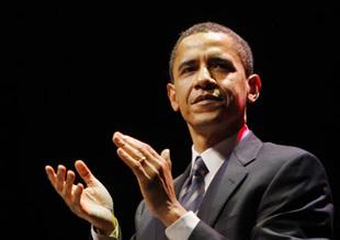 U.S. Democratic presidential candidate Senator Barack Obama (D-IL) applauds at the end of his speech at the Virginia Democratic Party Jefferson Jackson dinner in Richmond, Virginia Feb. 9, 2008. (Xinhua/Reuters File Photo)