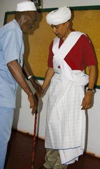 Sen. Barack Obama, D-Ill., right, is dressed as a Somali Elder by Sheikh Mahmed Hassan, left, during his visit to Wajir, a rural area in northeastern Kenya, near the borders with Somalia and Ethiopia in this file photo from Aug. 27, 2006. The garb was presented to Obama by elders in Wajir. Obama's estranged late father was Kenyan and Obama visited the country in 2006, attracting thousands of well-wishers. [Agencies]