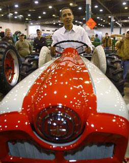 U.S. Democratic presidential candidate Senator Barack Obama (D-IL) sits on a tractor during a campaign stop at the Houston Livestock Show and Rodeo in Houston, Texas March 4, 2008. (Xinhua/Reuters Photo)