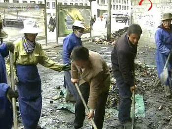 Environmental workers sent by the municipality are helping clean up.