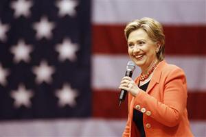 Democratic presidential candidate Hillary Rodham Clinton smiles while speaking on stage at a town hall meeting in Indianapolis March 29, 2008. (Xinhua/Reuters Photo)