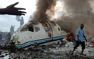 Flames from a wreckage of a passenger plane are seen after it crashed in Goma in the east of the Democratic Republic of Congo. Scores of people were killed when a passenger plane crashed and burst into flames shortly after take-off Tuesday at Goma in the east of the Democratic Republic of Congo, airport sources said. [Agencies]