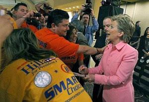 Democratic presidential hopeful New York Senator Hillary Clinton (R) greets union supporters following her speech at the Building Trades National Legislative Conference at the Washington Hilton hotel in Washington, DC. Clinton Wednesday faced lengthening odds for her White House bid as polls showed her personal ratings diving and her prospects clouding over in several key primaries. [Agencies]