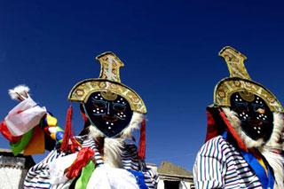 Performers dance at the launching ceremony of a five-year Tibet Autonomous Region key cultural relics protection project and the Tashilumpo Monastery protection project held at the Tashilumpo Monastery in Xigaze of southwest China's Tibet Autonomous Region on April 18, 2008.  (Xinhua Photo)