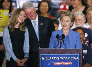 U.S. Democratic presidential candidate Senator Hillary Clinton (D-NY) with her husband, former President Bill Clinton (L) speaks to supporters at her North Carolina and Indiana primary election night rally in Indianapolis, Indiana, May 6, 2008.(Xinhua/Reuters Photo)