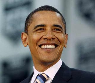 U.S. Democratic presidential candidate Senator Barack Obama (D-IL) smiles during a town hall-style meeting at Troy High School in suburban Detroit, June 2, 2008.   (Xinhua/Reuters Photo)