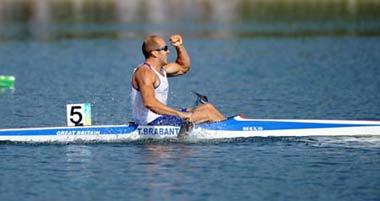 Tim Brabants of Great Britain celebrates after winning the Kayak single (K1) 1000m men final of Beijing 2008 Olympic Games Canoe/Kayak Flatwater event in Beijing, China, Aug. 22, 2008. Tim Brabants clinched the gold medal in this event with a time of 3:26.323. (Xinhua/Jiang Enyu) 