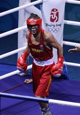 Vasyl Lomachenko of Ukraine reacts during Men's Feather (57kg) Final Bout between Vasyl Lomachenko of Ukraine and Khedafi Djelkhir of France of Beijing 2008 Olympic Games boxing event at Workers' Gymnasium in Beijing, China, Aug. 23, 2008. Vasyl Lomachenko defeated Khedafi Djelkhir, and won the gold medal of the event.(Xinhua Photo)