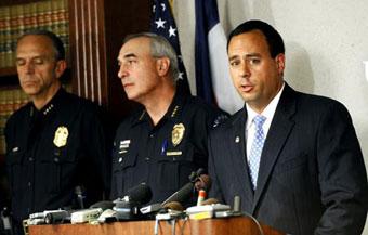 U.S. Attorney Troy Eid (R) gives a news conference about the arrest of Tharin Gartrell, Shawn Adolf and Nathan Johnson for possession of a firearms, body armor and methamphetamine, at the Office of United States Attorney District of Colorado in Denver, Colorado Aug. 26, 2008. U.S. authorities on Tuesday were investigating whether three men arrested in Colorado with guns and drugs planned to kill Democratic presidential candidate Barack Obama, but said they posed no real threat.(Xinhua/Reuters Photo)