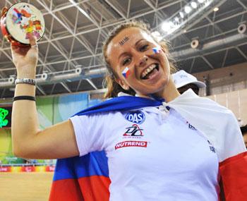 A foreign spectator cheers for cycling athletes with a traditional Chinese tabor during the Beijing 2008 Paralympic Games at the Laoshan Velodrome on September 10, 2008.