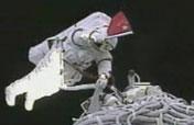 Astronaut performs E.V.A