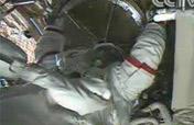 Astronaut exits orbital module