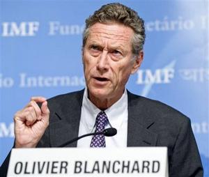 In this photo provided by the IMF, International Monetary Fund Chief Economist Olivier Blanchard speaks during the World Economic Outlook news conference, Wednesday, Oct. 8, 2008, at the IMF Headquarters in Washington.(AP Photo/IMF,Eugene Salazar)