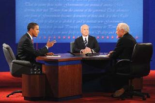 U.S. Democratic presidential nominee Sen. Barack Obama (L) (D-IL) answers a question in his third presidential debate with Republican presidential nominee Sen. John McCain (C) (R-AZ) at Hofstra University in Hempstead, New York, October 15, 2008.(Xinhua/AFP Photo)