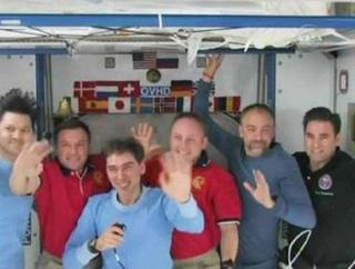 International Space Station crewmembers (from L) Oleg Kononenko, Yury Lonchakov, Sergei Volkov, Commander Mike Fincke, spaceflight participant Richard Garriott and Gregory Chamitoff wave goodbye during farewell ceremonies inside the Harmony module of the station October 23, 2008.REUTERS/NASA TV