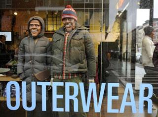 Two mannequins resemble U.S. Democratic presidential nominee Barack Obama and his wife Michelle are seen in a clothing store in New York on Oct. 28, 2008. As the presidential election day draws near, businessmen use the image of the presidential nominee to attract customers.(Xinhua/AFP Photo)