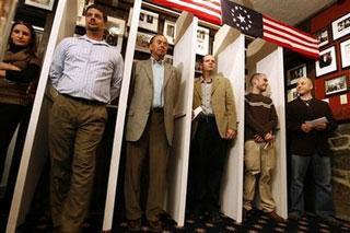 Dixville Notch residents wait for the stoke of midnight to be the first voters for the nation's presidential election in Dixville Notch, N.H. Tuesday Nov. 4, 2008.(AP Photo/Cheryl Senter)