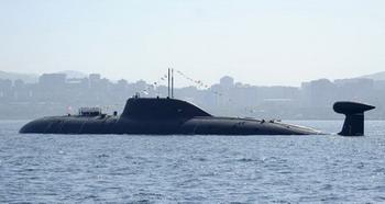 Russian seamen line up on an unidentified submarine believed to be an Akula-class submarine during a military parade training in Vladivostok in this July 25, 2008 file photo. More than 20 people were killed and another 21 injured in an accident aboard a Russian nuclear submarine in the Pacific Ocean, the navy said on Sunday, in the worst submarine disaster since the Kursk sank eight years ago. The RIA agency quoted a source in the Amur Shipbuilding Enterprise as saying the accident occurred aboard the Nerpa, a Project 971 Shchuka-B attack submarine, known inside NATO as an Akula-class submarine.[Agencies]