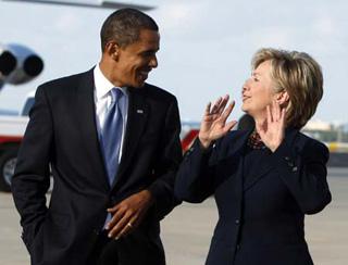 US Democratic presidential nominee Senator Barack Obama (D-IL) and Senator Hillary Clinton (D-NY) step off the campaign plane in Orlando, Florida, October 20, 2008.(Xinhua/Reuters Photo)