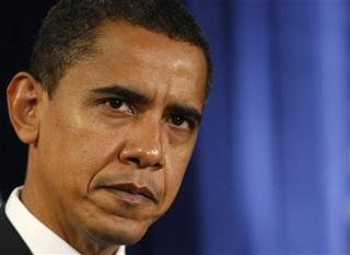 President-elect Barack Obama listens to a reporter's question during a news conference in Chicago, Sunday, Dec. 7, 2008.(AP Photo/Charles Dharapak)