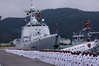 A ceremony is held before a Chinese naval fleet sets sail from a port in Sanya city of China's southernmost island province of Hainan on Dec. 26, 2008. The Chinese naval fleet including two destroyers and a supply ship from the South China Sea Fleet set off on Friday for waters off Somalia for an escort mission against piracy.(Xinhua/Zha Chunming)