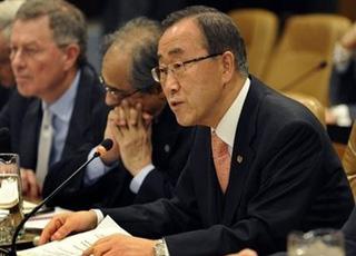 United Nations Secretary General Ban Ki-moon (R) speaks before the start of a meeting at the United Nations on the situation in Gaza.(AFP/Timothy A. Clary)