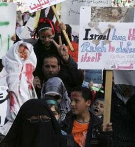 Jordanians attend a protest against Israeli attacks on Gaza, in Amman January 8, 2009. REUTERS/Majed Jaber