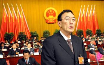 Qiangba Puncog (R), Tibet Autonomous Regional Government chairman, delivers his work report to the regional people's congress during the second session of the Ninth Regional People's Congress of Tibet Autonomous Region in Lhasa, capital of southwest China's Tibet Autonomous Region, Jan. 14, 2009. The session opened here on Wednesday. (Xinhua/Gaesang Dawa)