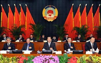 Jia Qinglin (C Front), chairman of the National Committee of the Chinese People's Political Consultative Conference (CPPCC), attends the fourth meeting of the Standing Committee of the 11th CPPCC National Committee in Beijing, capital of China, Feb. 27, 2009. The meeting went to a successful conclusion here Friday. (Xinhua/Huang Jingwen)