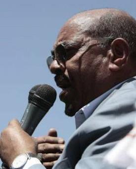 Sudan's President Omar Hassan al-Bashir delivers a speech to the crowd during a protest against ICC's arrest warrant for him in Khartoum March 5, 2009.REUTERS/Zohra Bensemra