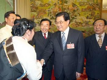 Chinese President Hu Jintao (2nd R) joins a panel discussion with deputies to the Second Session of the 11th National People's Congress (NPC) from southwest China's Tibet Autonomous Region, in Beijing, capital of China, March 9, 2009.(Xinhua Photo)