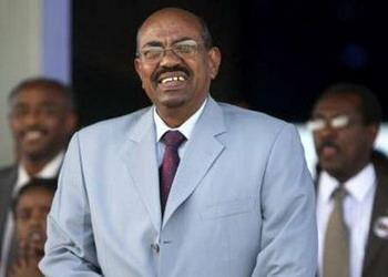 Sudan's President Omar Hassan al-Bashir arrives at the airport in the capital Khartoum, March 23, 2009. Sudan's president briefly visited Eritrea on Monday on his first foreign trip since he was indicted by the International Criminal Court for war crimes in Darfur.REUTERS/Mohamed Nureldin Abdallh