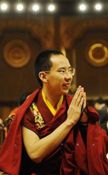 The 11th Panchen Lama, Bainqen Erdini Qoigyijabu, attends the opening ceremony of the Second World Buddhist Forum (WBF) in Wuxi, east China's Jiangsu Province on March 28, 2009. The Second WBF opened here on Saturday.(Xinhua/Wu Xiaoling)